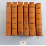 A set of poetry books on orange calf skin published by Henry Frowde