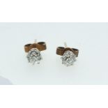 A pair of 9ct gold diamond stud earrings (silver gilt butterflies) 0.5ct total