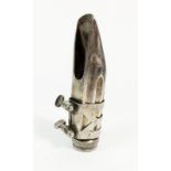 An early 20thC Henri Selmer metal musical mouthpiece possibly for a Saxophone
