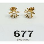 A pair of 10ct gold and pearl earrings