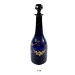 A Georgian Bristol blue and gilt painted small decanter, 26cm