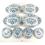 A set of four Meissen oval basket form serving dishes in the Onion pattern 29 x 21 cm and four
