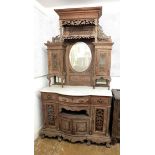 A Malaysian Colonial (Malaccan) carved side cabinet in Victorian style with display tiers and