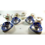 A Queens Virginia Strawberry part tea set consisting teapot, two cups and saucers, small bowl,