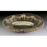 A large silver cake basket with embossed swag decoration, London 1773, by Richard Mills, 675g