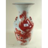 A large 19th century Chinese vase painted dragon with mask and ring handles to shoulders, 43cm tall