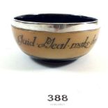 A Royal Doulton pottery silver mounted bowl, inscribed 'Glud Pleal maks braw bairns' c1910. 11.5cm