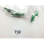 A parcel of calibrated round emeralds, total 27.1cts (1.5-2mm, 2.5-3mm, 3.5-4mm)