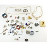 A box of various costume jewellery