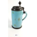 An 18thC blue pottery stein with floral painted decoration, dated pewter lid 1789, 26cm