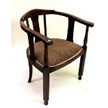 A bow back stained wood corner chair