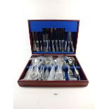 A stainless steel cutlery set in fitted case