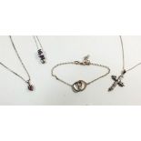 Four various silver necklaces