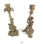 Two gilt metal cherub candlesticks, 29cm