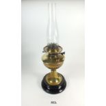 An early 20th century brass oil lamp