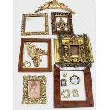 A box of gilt picture or mirror frames, two wooden ones and some gilded mouldings
