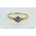 An Edwardian small diamond cluster ring, size S