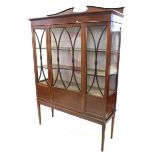 An Edwardian mahogany display cabinet with chequered stringing