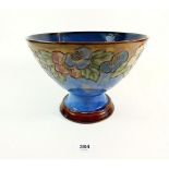 A Royal Doulton stoneware pedestal bowl with tube lined decoration of flowers c1920, 16cm high