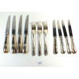 A Roberts Belk silver plated part set of four dinner knives, four tea knives and three forks