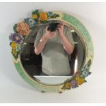 A vintage Barbola floral framed easel mirror, 46cm diameter