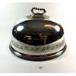 A large oval silver plated meat cover with engraved decoration, 18 x 15 x 12cm