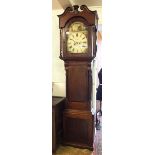 An early 19th century mahogany longcase clock with swan neck pediment over painted face with rocking