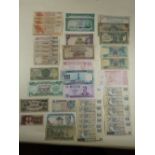 A wad of World banknotes mainly Far East, 20th & 21st century examples including: Afghanistan, Burma