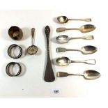 A group of silver teaspoons and three napkin rings etc, 194g