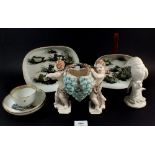 A porcelain white bisque Kingfisher, 16.5cm plus two Copenhagen dishes decorated ducks, Wedgwood