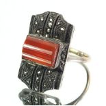 An Art Deco marcasite and cornelian ring set in silver on 9 carat gold band, size M - N