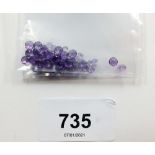 A parcel of calibrated round amethysts, total 15.25cts, (3mm, 3.5mm, 4mm)