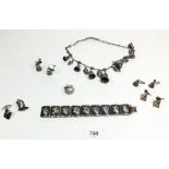 A quantity of Siam silver Niello jewellery including necklace with bells and matching bracelet etc