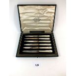 A set of six silver and mother of pearl fruit knives cased, Sheffield 1925