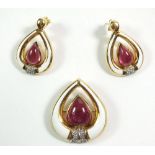 A Gerald Benney 18ct gold pair of earrings and matching brooch, all set with pear form rubelite
