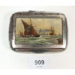 A small 19thC metal tobacco box with hand painted scene to lid of fishing boats