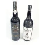 A bottle of Warres Tercentenary 1970 vintage port together with a Warre's Port 1999