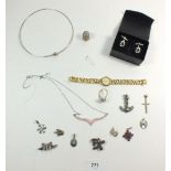A box of costume jewellery including two silver brooches and seven silver pendants/chains