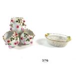 A Herend floral porcelain basket and a miniature floral egg form vase