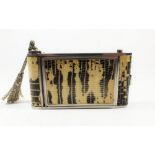 A 1950's snakeskin ladies evening/vanity purse in the form of a camera with powder compact and