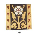 A 19thC encaustic tile of Gothic design W. Godwin of Lugwardine. 15cm square