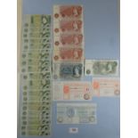 A wad of Bank of England banknotes including: (4) ten shillings prefix Y13 Hollom, A57N, 56W, 26X,