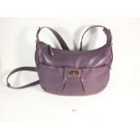 A Radley burgundy leather handbag