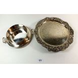 An Elkington and Co. silver plated holder together with a silver plated salver with rococo edge