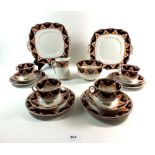 A Royal Albert Crown china part tea service comprising: four cups and saucers, five tea plates,