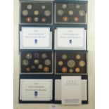 A Royal mint issue: UK proof coin collections. Years: 1990 Welsh, 1991 Northern Ireland, 1992