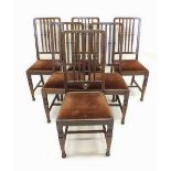 A set of six 1920's oak slat back dining chairs