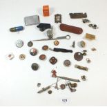 A box of collectables to include whistles, buttons, enamel badges etc
