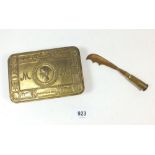 A WWI 1914 chocolate box and a bullet Trench Art paperknife