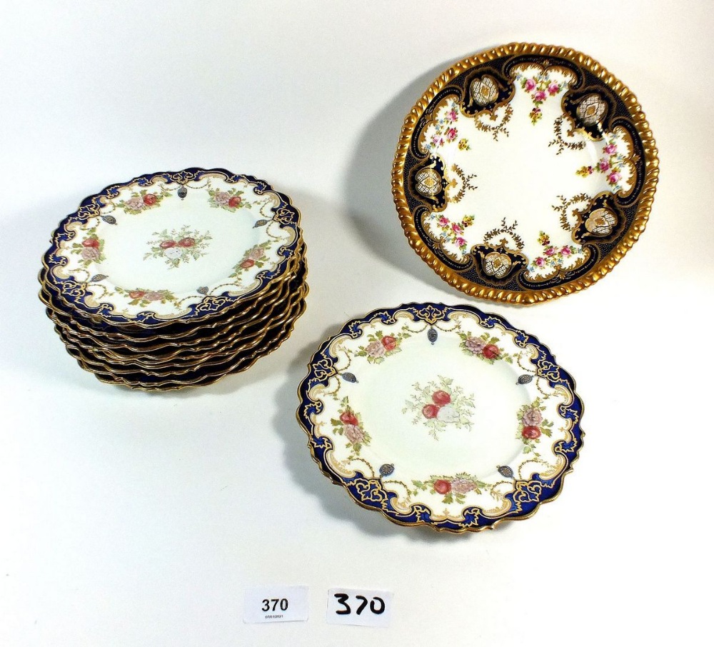 A set of ten Paragon floral dessert plates with navy and gilt borders and a similar Wedgwood comport